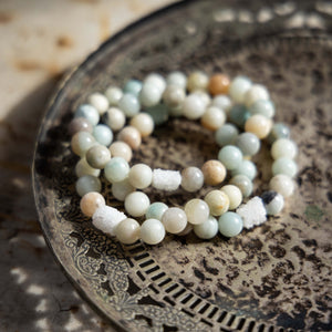 Stack of 3 Amazonite Crystal Bracelets on a metal tray