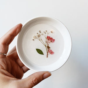 Pressed flower trinket dish with pink and white flowers