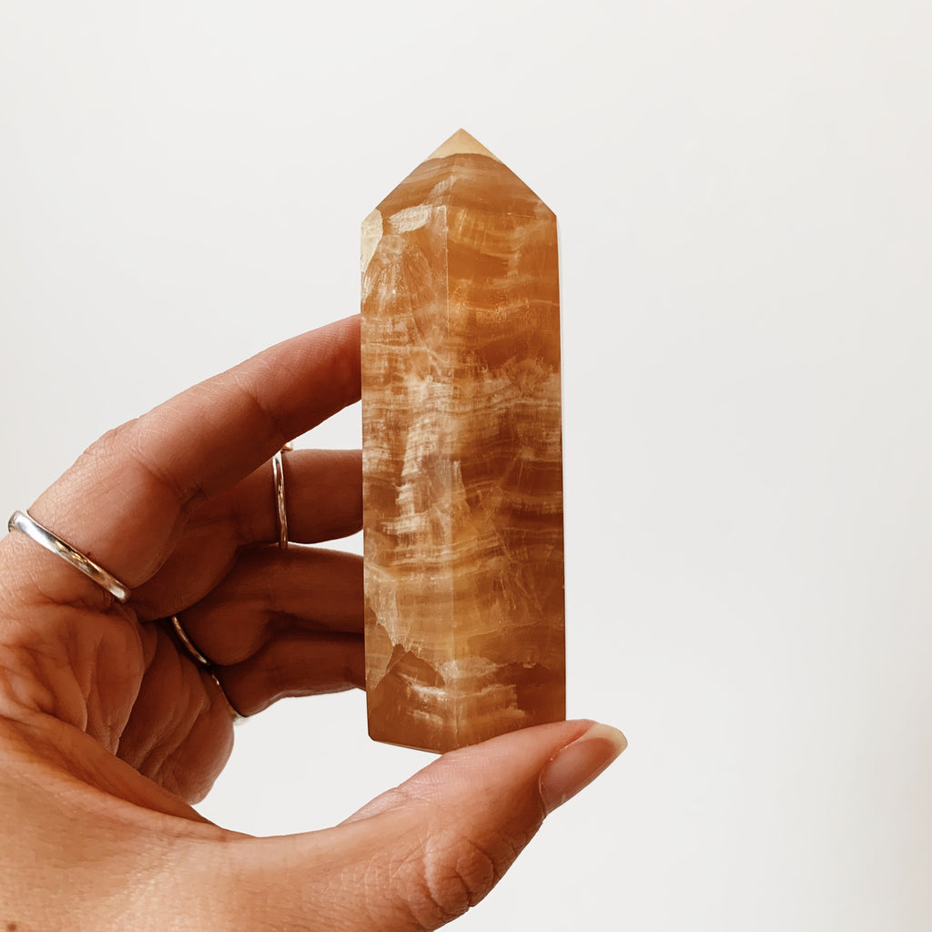 Honey calcite offers tower