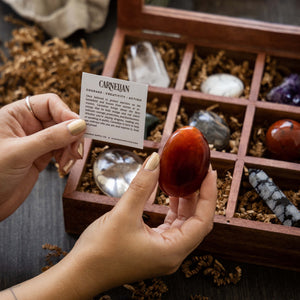 Carnelian Palm Stone and information card included in our Crystal Advent Calendar