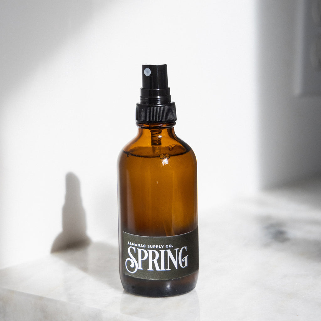 Spring Room Spray on white marble counter