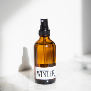 Winter Room Spray on a white marble counter