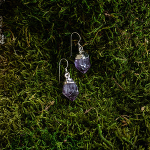 A pair of urple Amethyst crystal point earrings