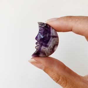 Small carved Amethyst moon with face
