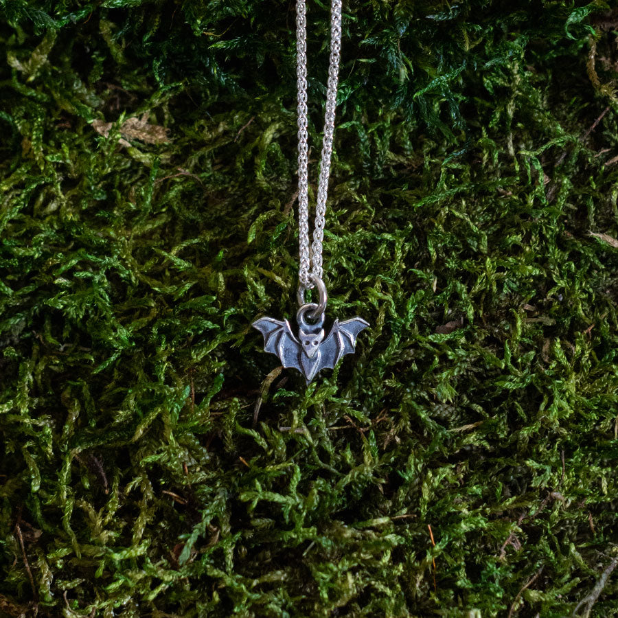 Silver bat charm