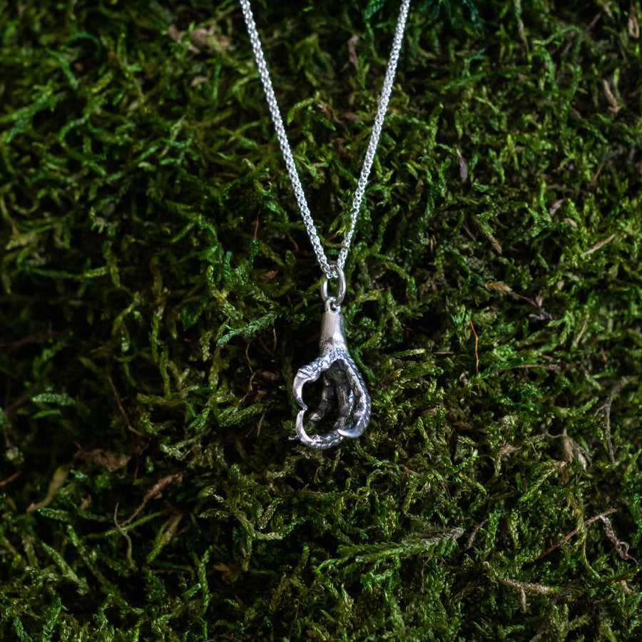 Silver talon charm