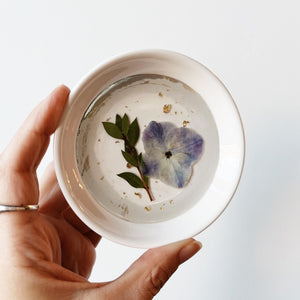 Pressed flower ring dish with purple flower and leaves