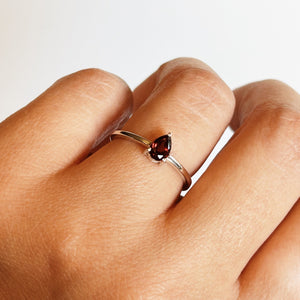 Garnet and silver ring with small stone