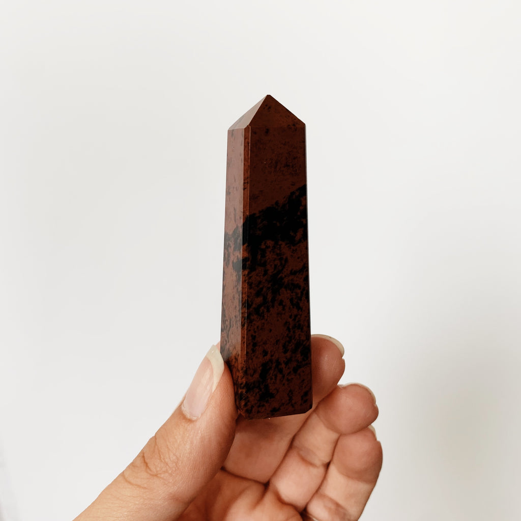 Four-sided Mahogany Obsidian tower