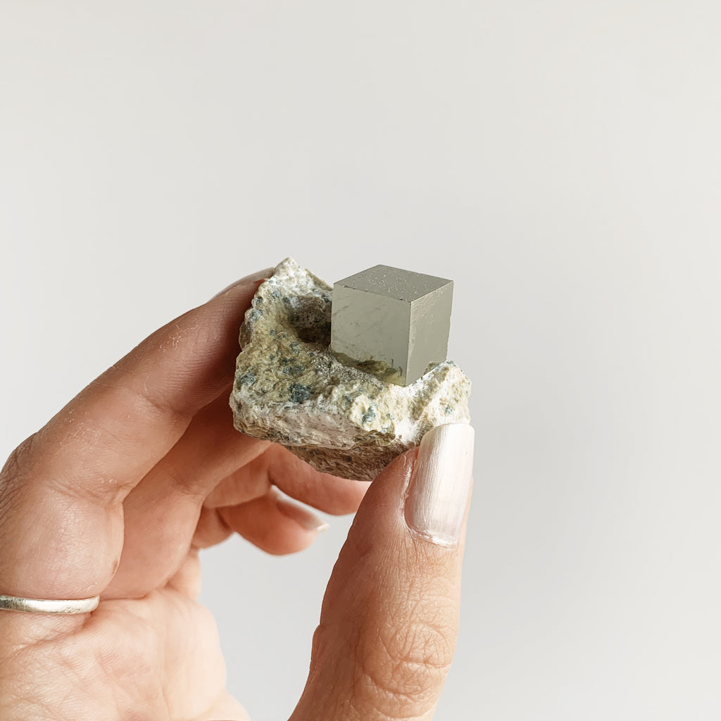 Pyrite cube on matrix