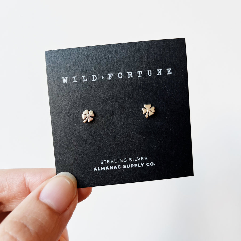Silver four leaf clover stud earrings