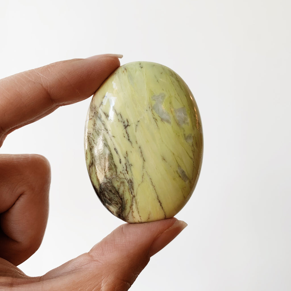 Serpentine palm stone