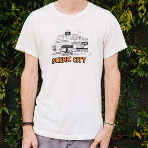 Black and white Scenic City t-shirt, orange text reads “Scenic City”